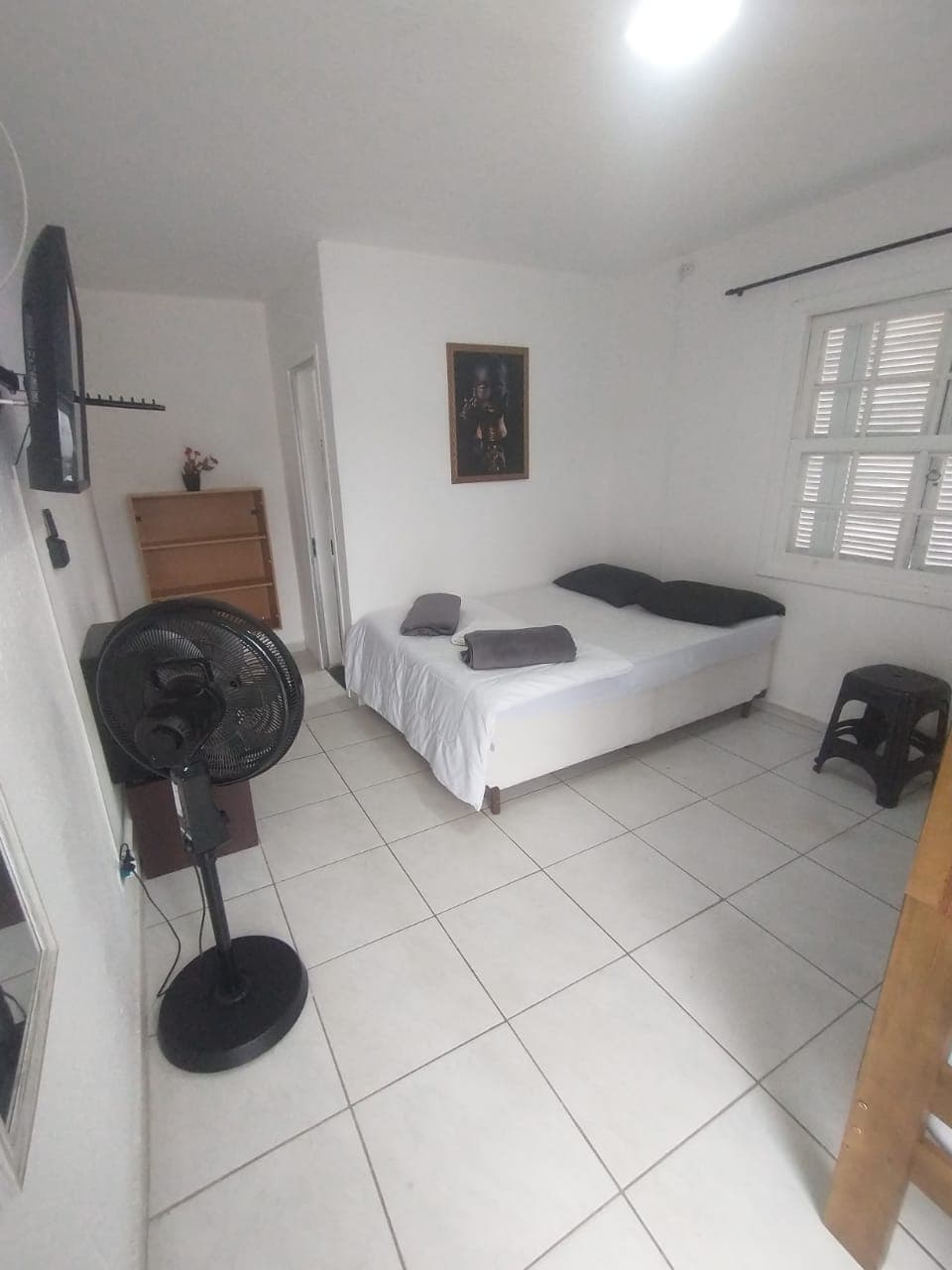 Quarto duplo com camas de solteiro