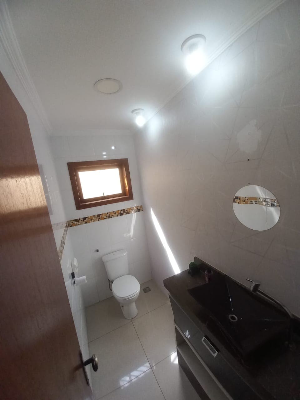 Fachada da casa com acesso principal