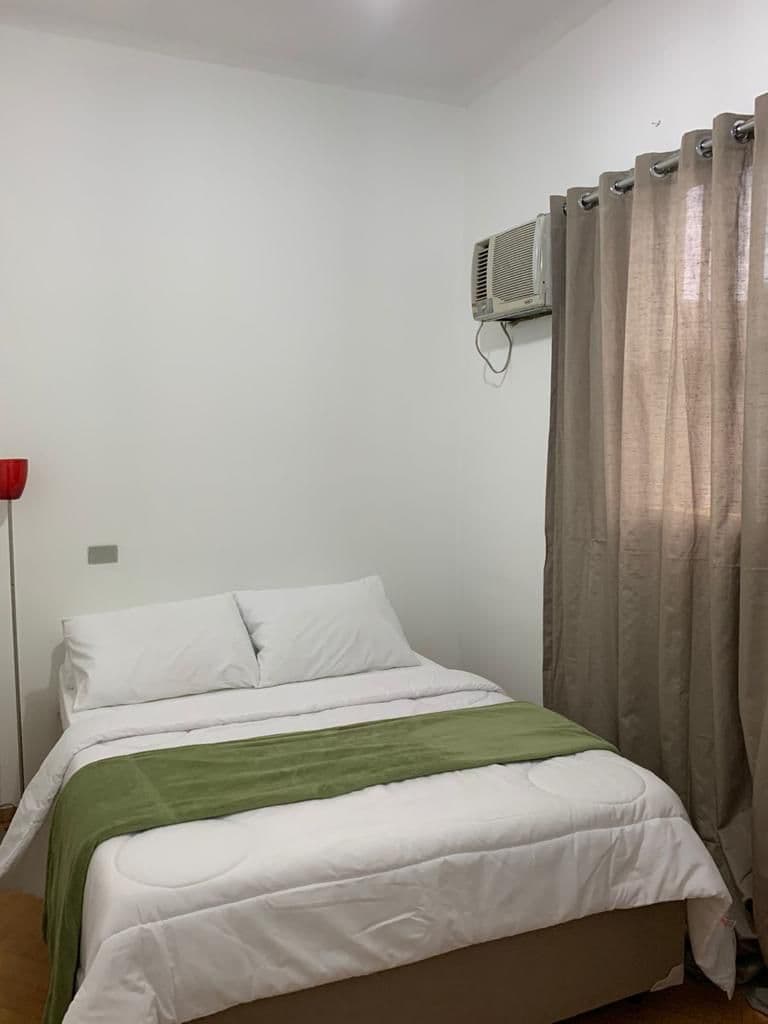 Quarto confortável e acolhedor